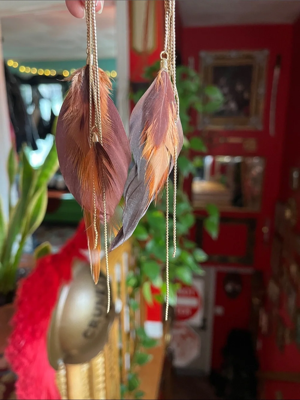 Gold dangle + brown feather earrings